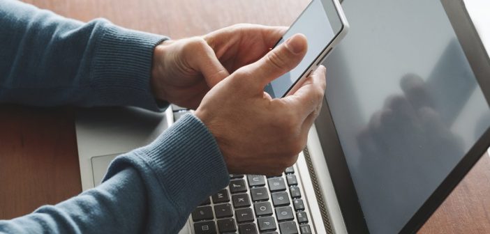 Secure Your Financial Details With Two Factor Authentication Laptop and mobile phone