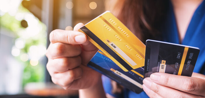 Surprising Factors That Could Be Affecting Your Credit Application Women holding credit and debit cards