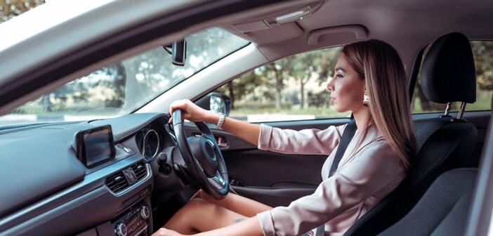 The Pros and Cons of Car Finance Women driving car